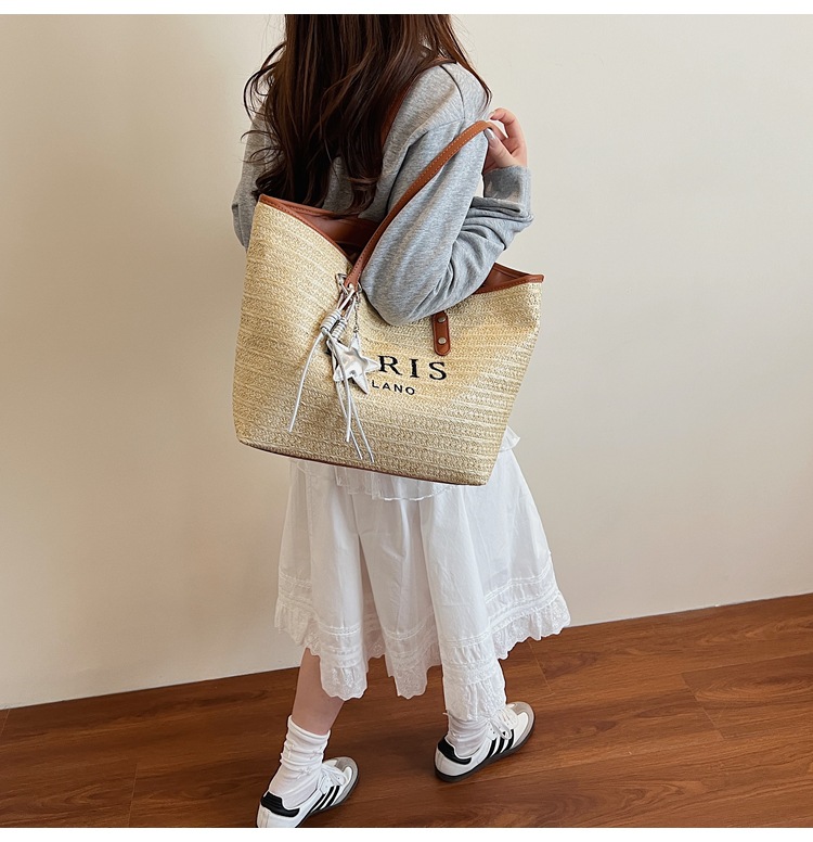Summer striped woven large-capacity tote bag 2025 New style fashionable and trendy Korean style simple and elegant casual single-shoulder bag undefined