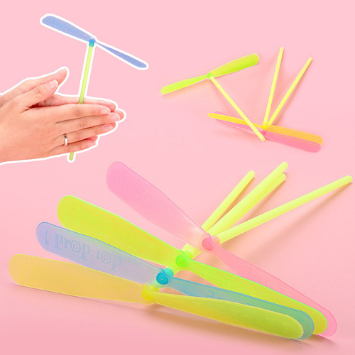Small gifts for local promotion, plastic flying fairy, luminous flying saucer, bamboo dragonfly slingshot and arrow children's small toys