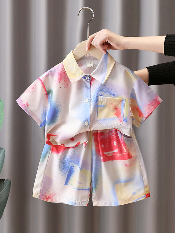 7180 Traje de verano para niños 2025 Nuevo estilo Camisa de flores rufián Ropa de playa Traje de tres piezas de manga corta de verano para niños