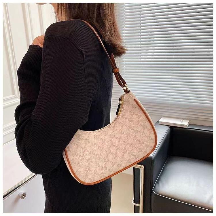 Elegante halve maan schoudertas voor dames stijlvolle design tas_voghion.com
