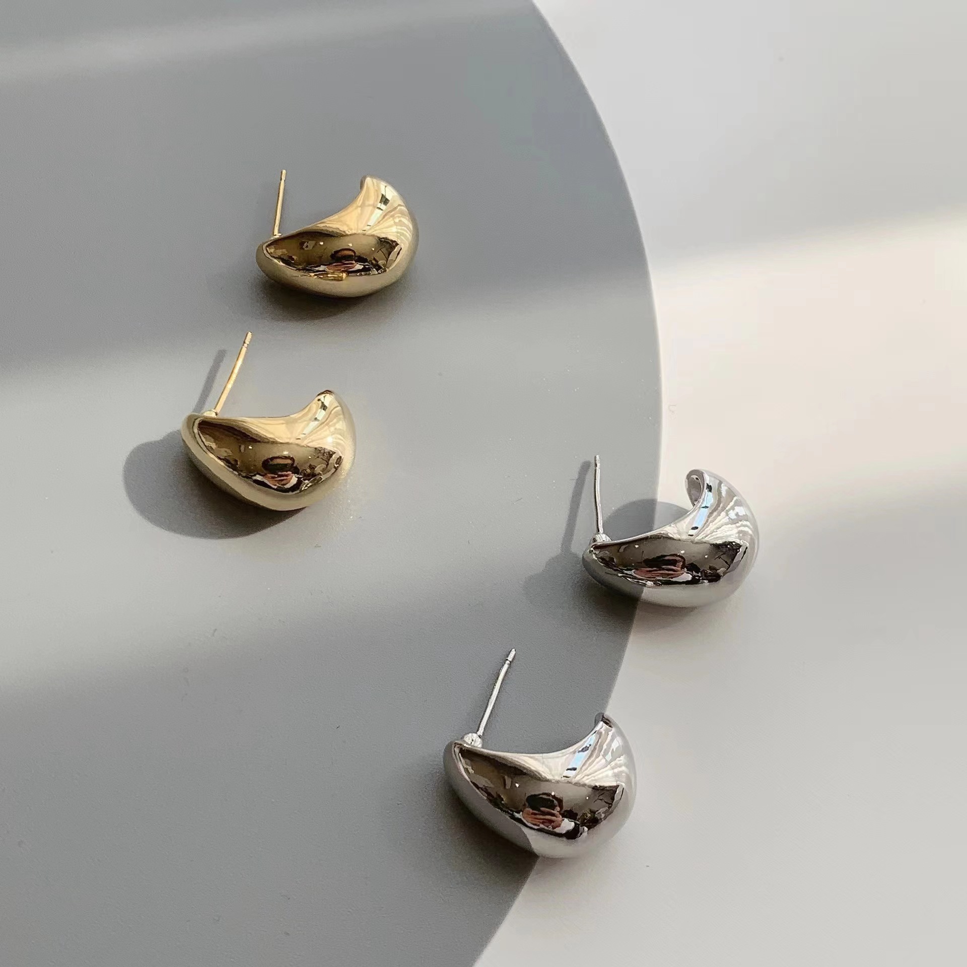 Glossy elegant fashionable earrings