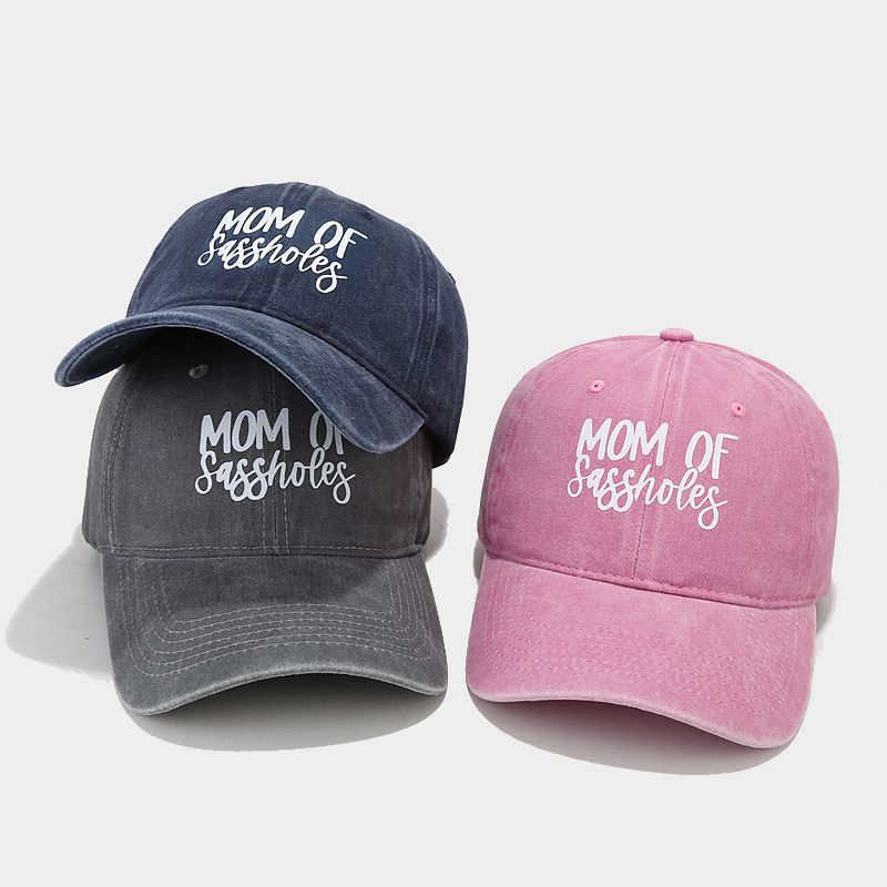 Moda europea y americana nueva impresión de transferencia térmica línea de palabras tapa suave gorra de béisbol femenina primavera y verano casual todo partido protección solar marea