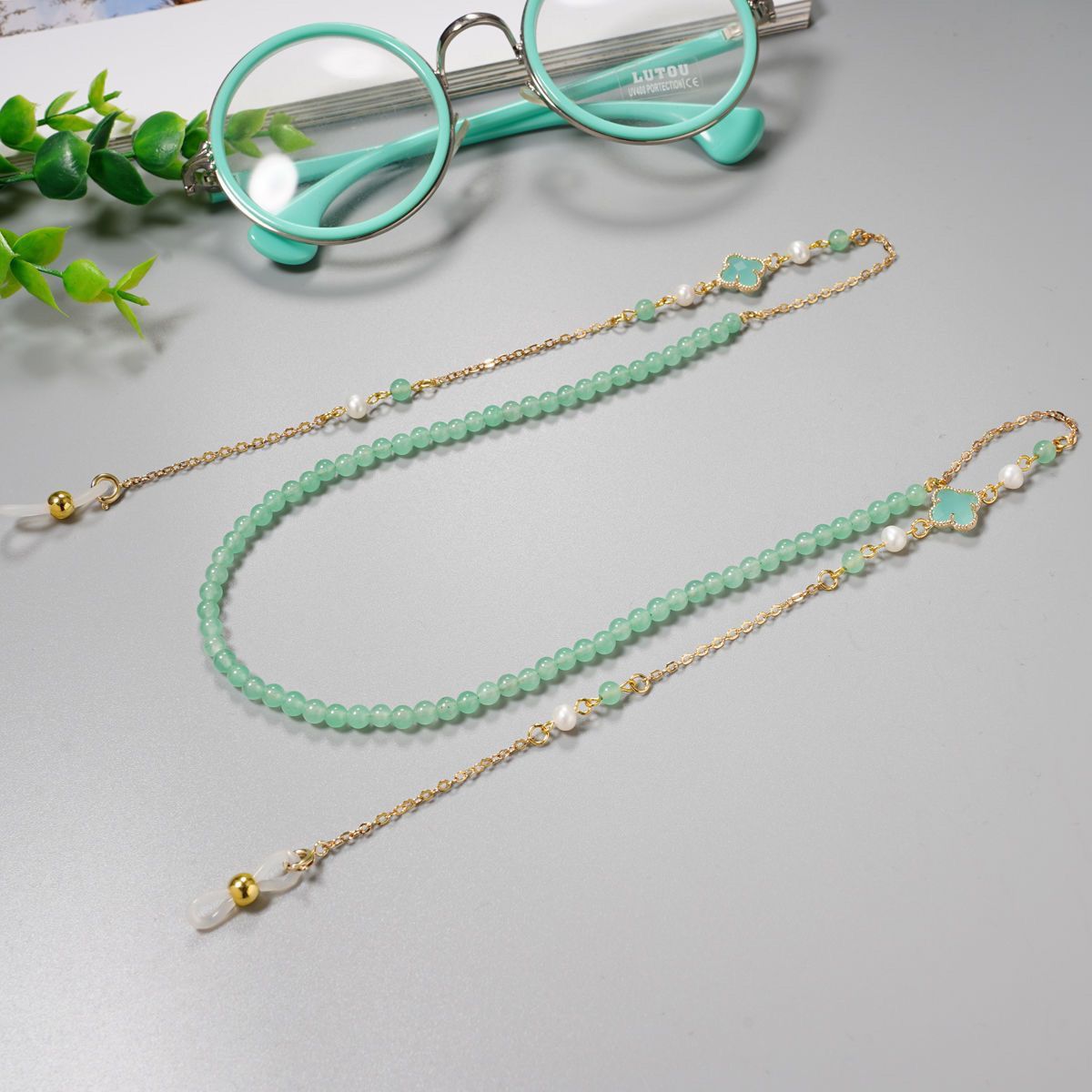 Perla natural cristal cuatro hojas gafas cadena gafas de sol cadena retrógrada mujer colgar gafas cuerdas Lolita medula