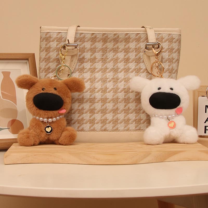 Las celebridades de Internet son lindas y lindas nariz grande colgante de perro de tierra occidental muñeca de peluche bolsa de perro colgante llavero bebé