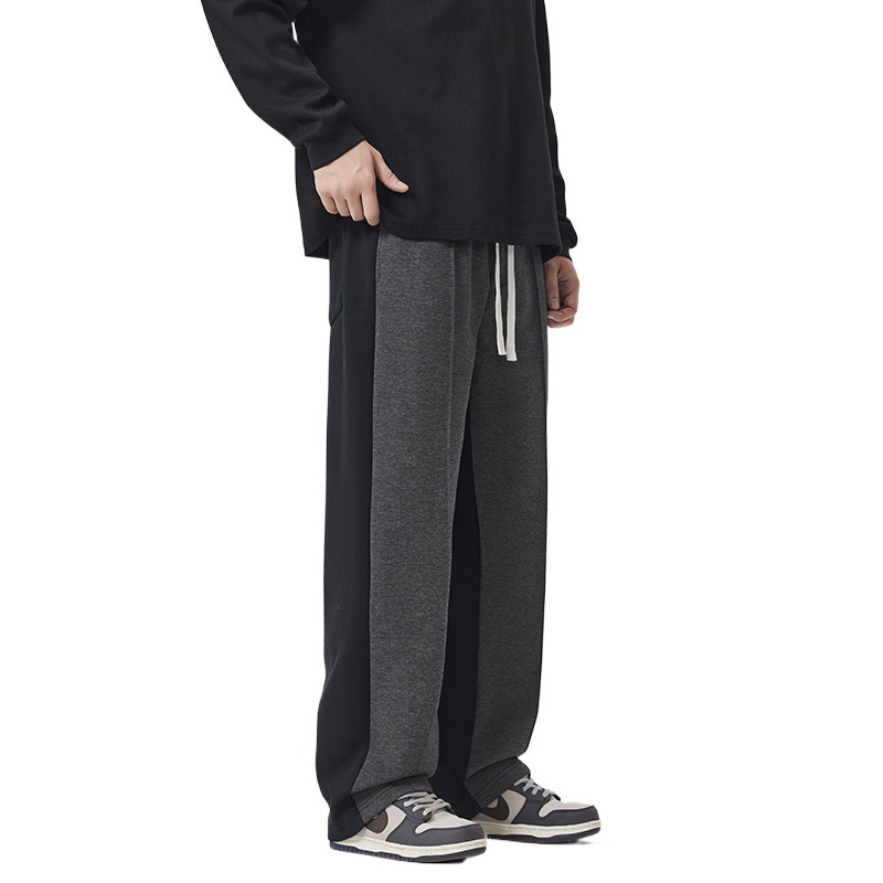 Nuevos pantalones pesados de estilo masculino estilo de moda casual diseño de pantalones de dos colores sueltos pantalones deportivos rectos versátiles