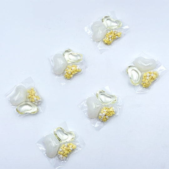 Factory wholesale laundry beads retention fragrance beads three-in-one laundry boxed retention fragrance sterilization and mite removal household liquid ball