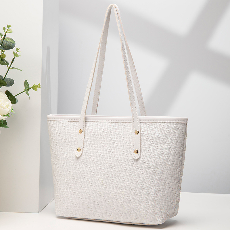 Mayorista trenzado impresión cremallera relieve de moda generosa 2023 bolsos de mano bolsos especiales de gran capacidad de moda triángulo image 10