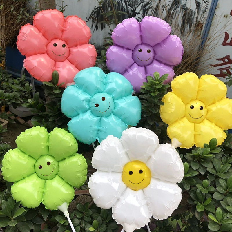 Flores de sol sonrientes globo de flores de mano con margaritas para empujar hacia el sol, película flotante vacía flores al por mayor