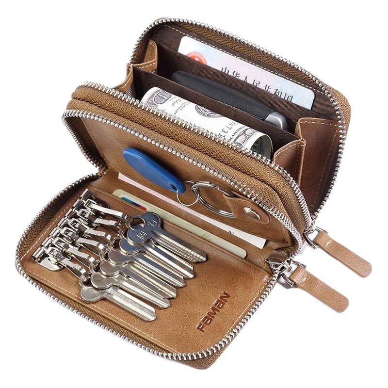 創意的な自動車のキーは男性の本革のファスナーの男性の鍵を包んで牛皮の多機能の腰を掛けて鍵をかけます。