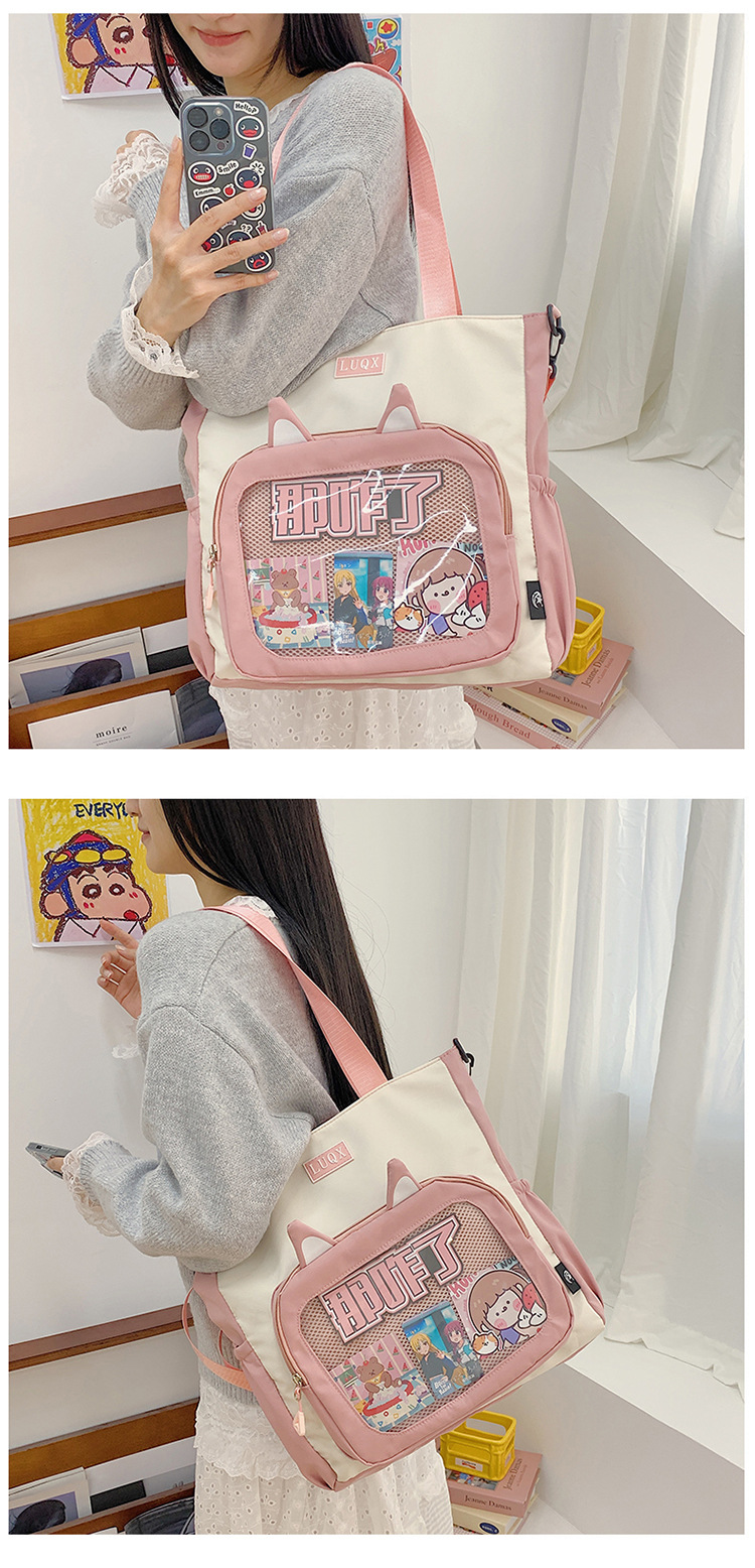 The new cute cartoon printed student bag with a large capacity and transparent student storage single-shoulder bag is selling well for women undefined