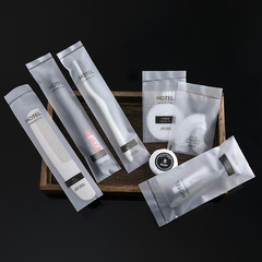 Hotel disposable toiletries toothbrush and toothpaste set hotel B&B home shower gel shampoo