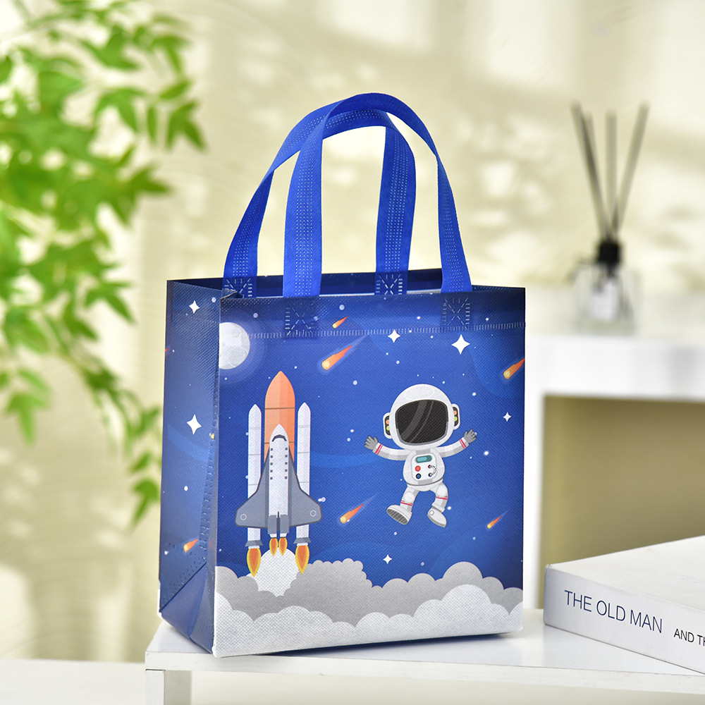 Bolso no tejido de astronauta de dibujos animados transfronterizo bolso de regalo de astronauta portátil bolso de regalo de niños lindos al por mayor