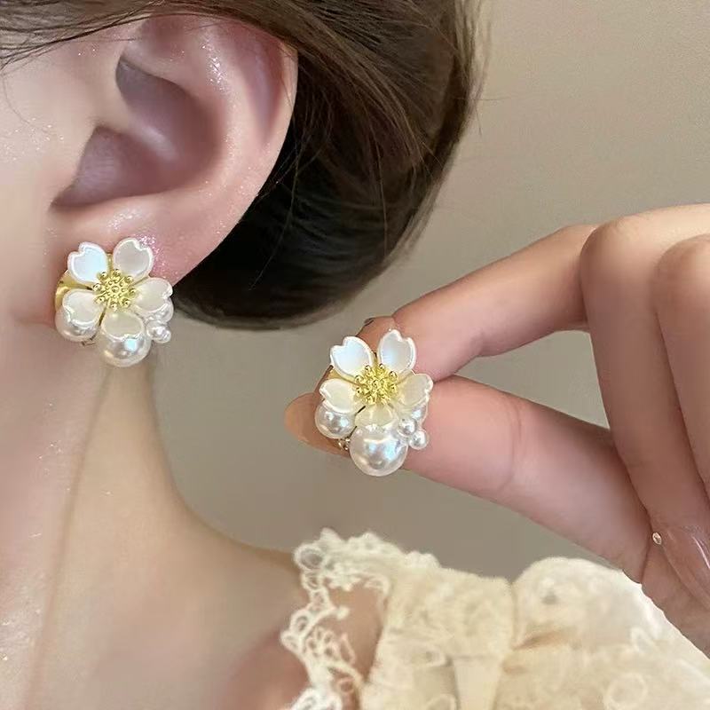 Aguja de plata, perla, circón, borla, pendientes de moda, lujo ligero, pendientes de alta gama, pendientes de todo fósforo exquisitos de nicho, mujeres al por mayor