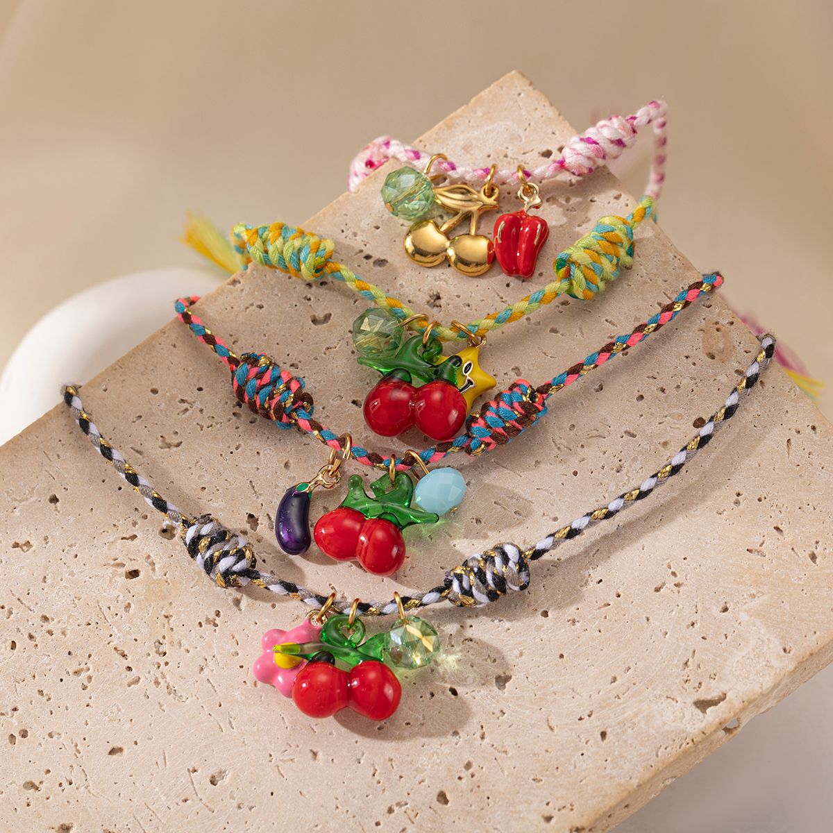 Tena Europa y América Colgante de acero inoxidable Mujer Pastoral Fruta Cereza Cuerda Tejida Pulsera Joyería de explosión transfronteriza simple