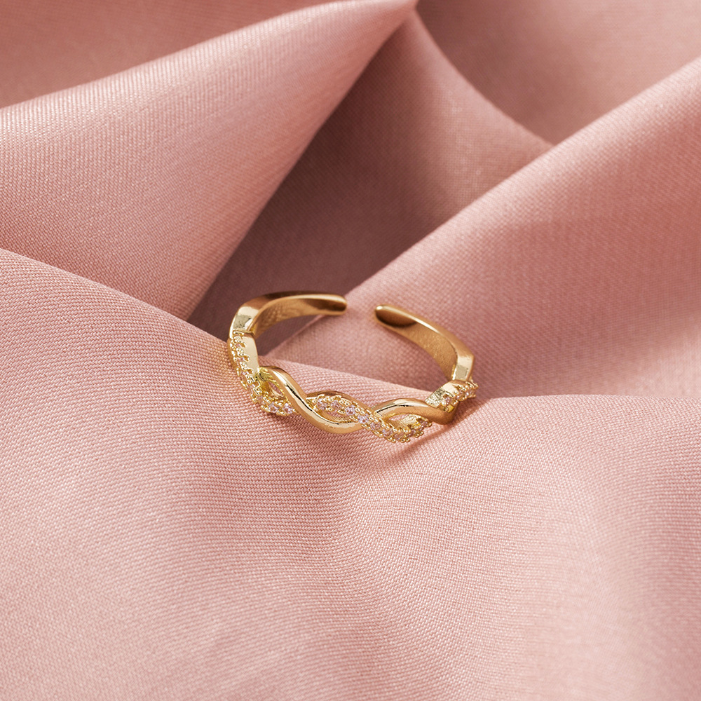 European And American Niche Golden Ring Micro-inlaid Simple Twist Open Ring Wholesale display picture 5