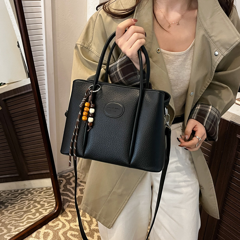 Bolso de mano para mujeres 2025 nuevo estilo de invierno de alta calidad nicho lujoso retro bolso de hombro bolso de balde de agua image 1