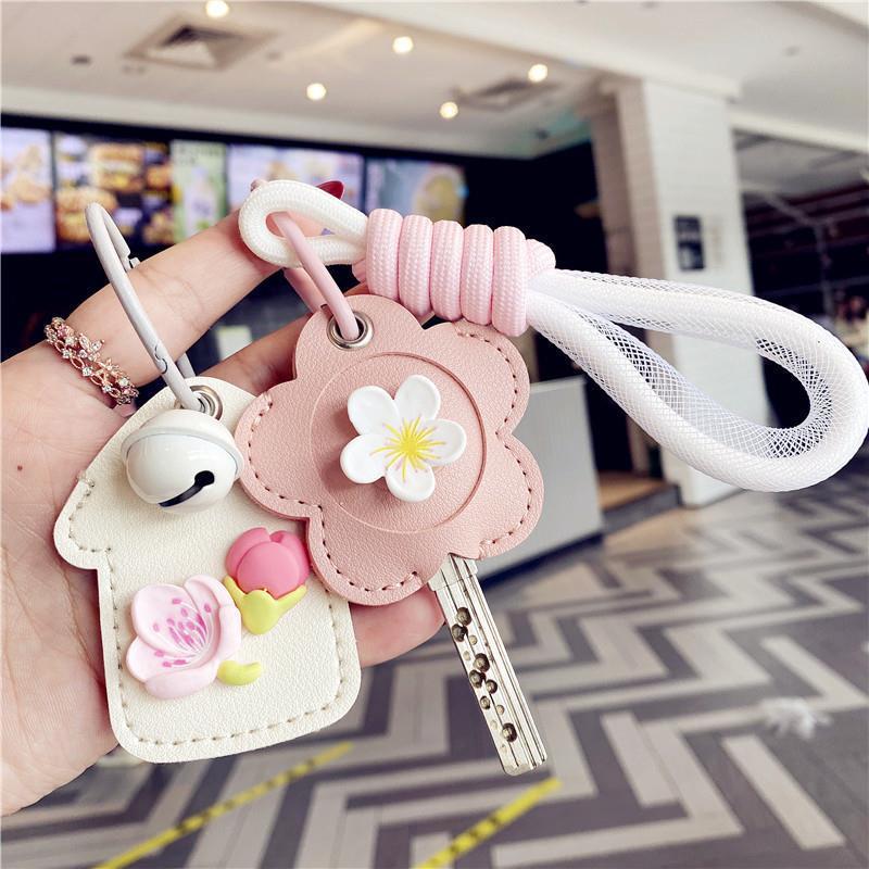 Cubierta de la llave nuevo corazón de niña explosiva Llavero Coche eléctrico PU Cubierta de la tarjeta de control de acceso para el hogar Sensor de gota de agua Amazon