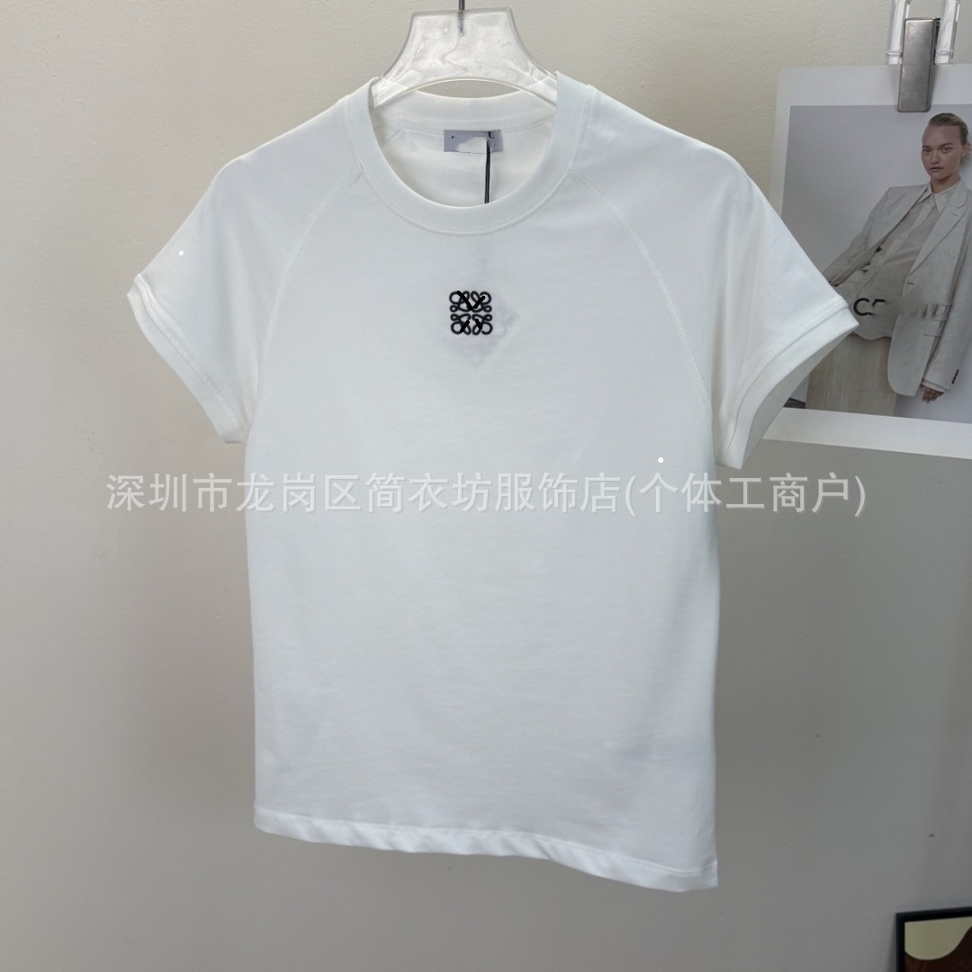 特価区の南油の婦人服の年の早春の新型の簡単なファッションは襟の経典をひっくり返します。