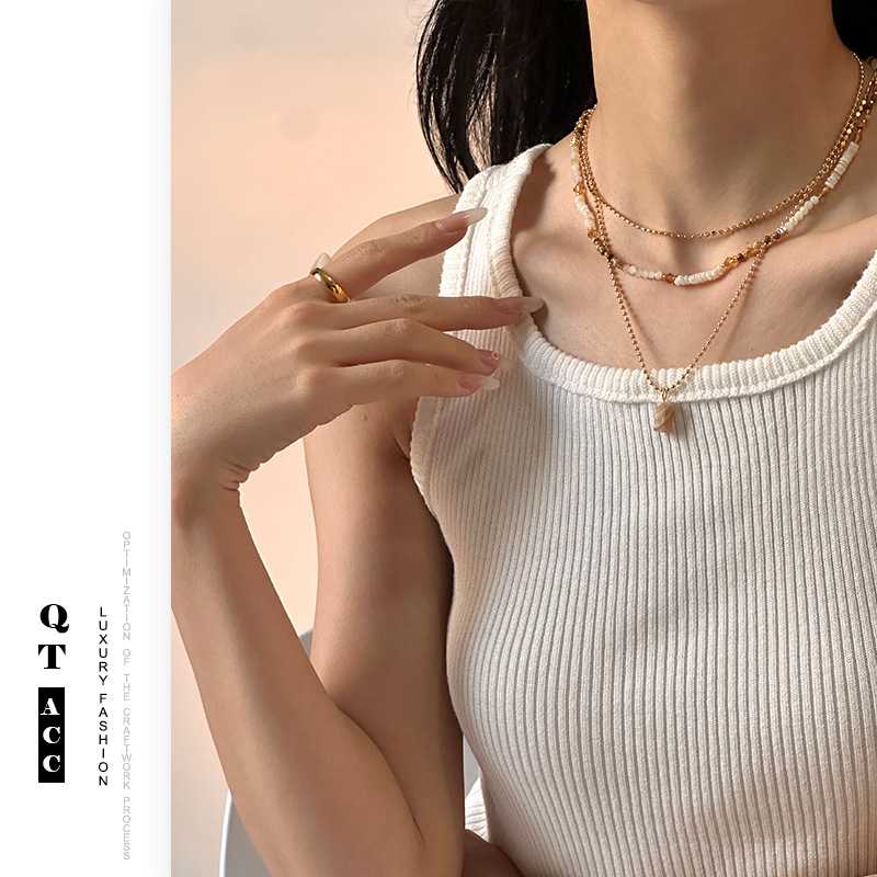 Simple estilo ligero lujo chaîne de bolas caliente nicho universal hermoso diseño de colgante de piedra solar nuevo collar mujer image 1