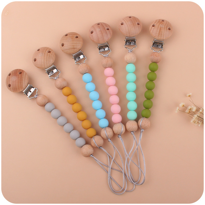 Nuevo bebé suministros de silicona de cuatro piezas conjunto chupete bebé silicona pezón pulsera dedo manga cepillo de dientes pezón cadena