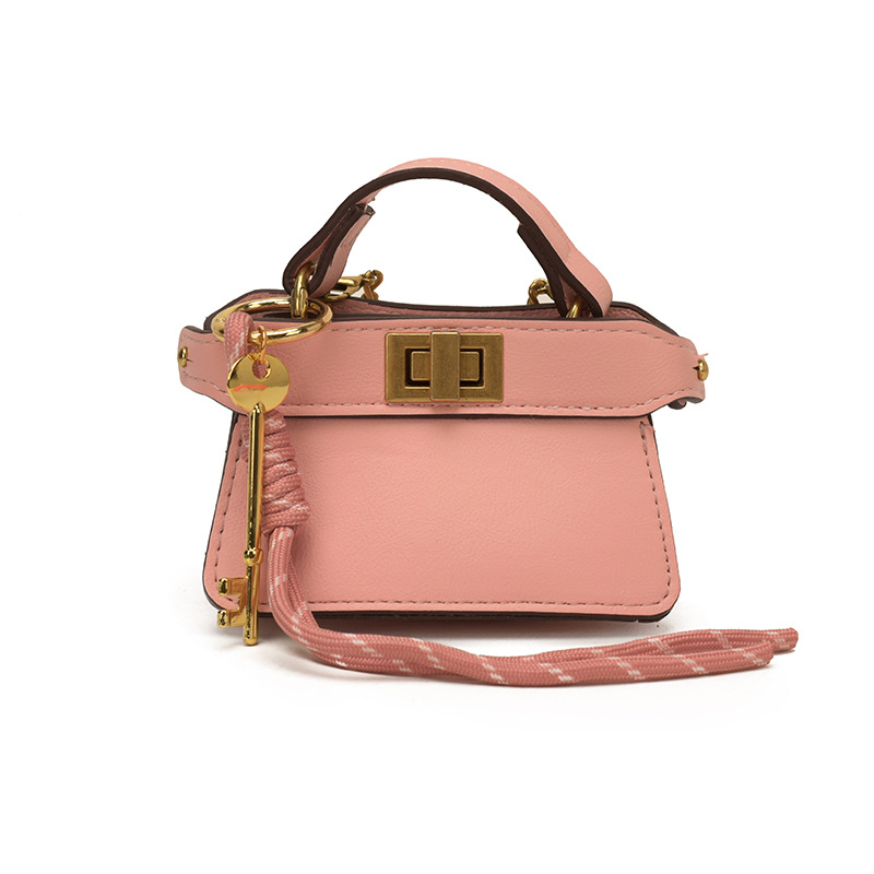 Coreano simple bolso de niña de color sólido mini bolso de bebé 2026 bolso para niños de comercio exterior transfronterizo