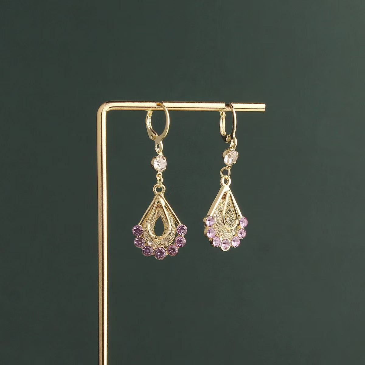 El estilo francés ultra-flash gota de agua de malla de diamante nicho de diseño ligero lujoso y sofisticado estilo versátil de alta sensación de joyas de orejas
