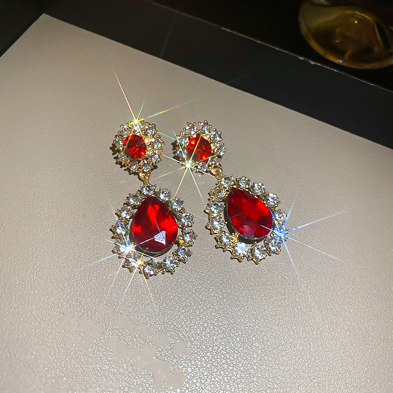 Pendientes de gota de agua de flores de diamantes de aguja de plata Pendientes de temperamento de nicho retro femenino Pendientes de personalidad de moda Lujo ligero Sentido de alta gama