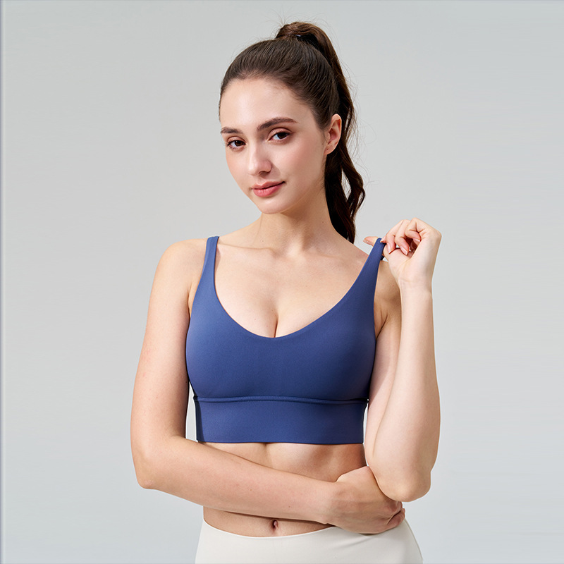La nueva ropa interior deportiva a prueba de golpes transfronteriza para mujeres se reúne profundamente V fitness hermosa espalda desnuda con almohadilla para el pecho sujetador de yoga sin costuras