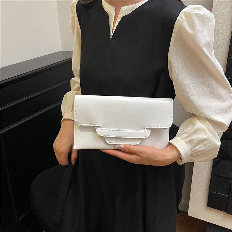 Bolso de mujer de color sólido bolso de cambio de mujer bolso de mano de alto valor de cara simple bolso corto de moda bolsa de sobres versátil