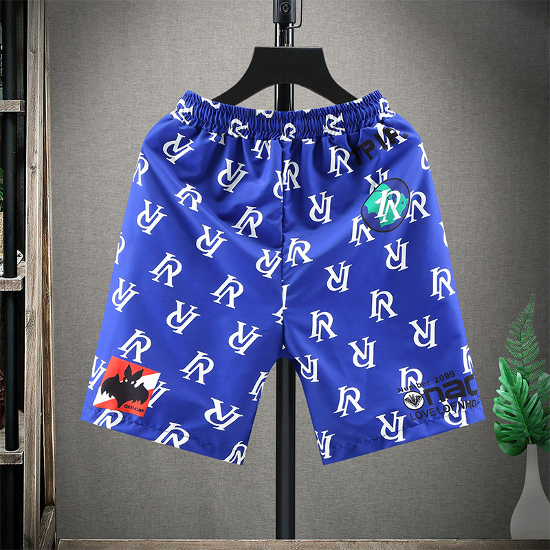 À la mode pour les hommes portent des pantalons de sport décontractés de marque de mode, vêtements de plage, beaux shorts tendance_voghion.com