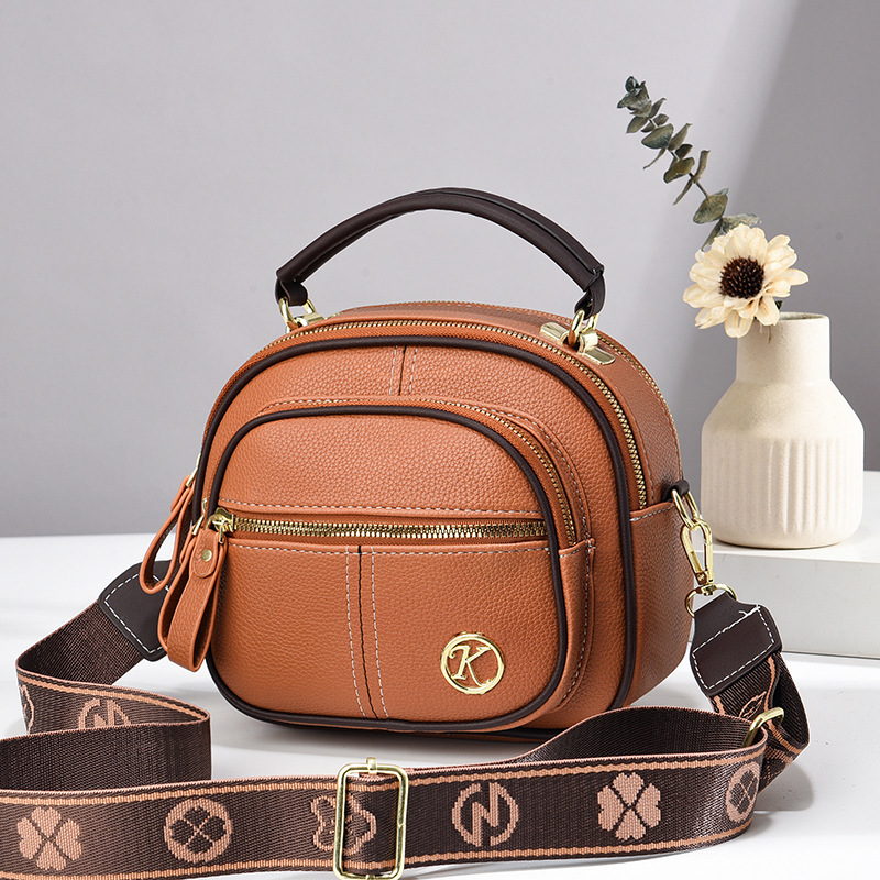 Exquisita mini bolso de verano 2025, nuevo bolso redondo, bolso de hombro casual versátil, bolsos de mano