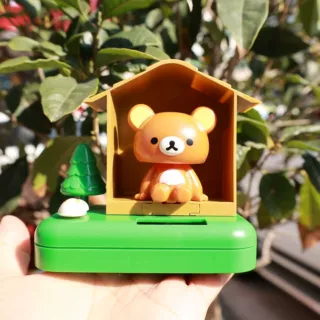跨境太阳能汽车装饰摆件树屋熊猫摇摆车载饰品办公室招财创意用品