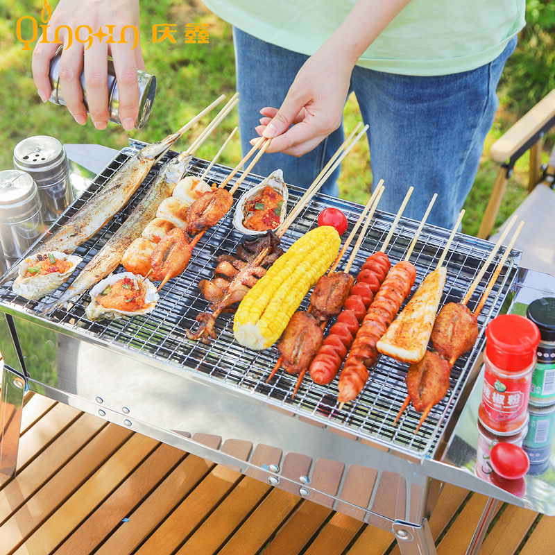 Fabricantes personalizados plegables al aire libre parrilla de barbacoa portátil carbón doméstico grueso pequeño horno de barbacoa de acero inoxidable