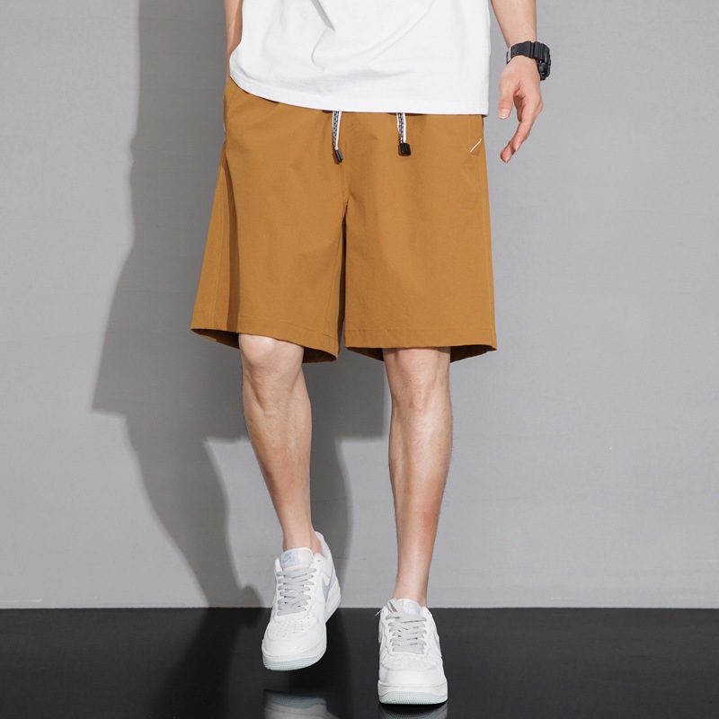 Nuevos pantalones cortos de verano para hombres, cinco puntos de la ciudad, herramientas al aire libre, tendencia, carga, relajado, casual, simple, color sólido