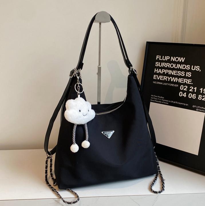 Bolsa de gran capacidad para mujeres 2024 nueva mochila multifuncional de tres usos, sensación de alto nivel, mochila de hombro para viajes casuales versátiles.