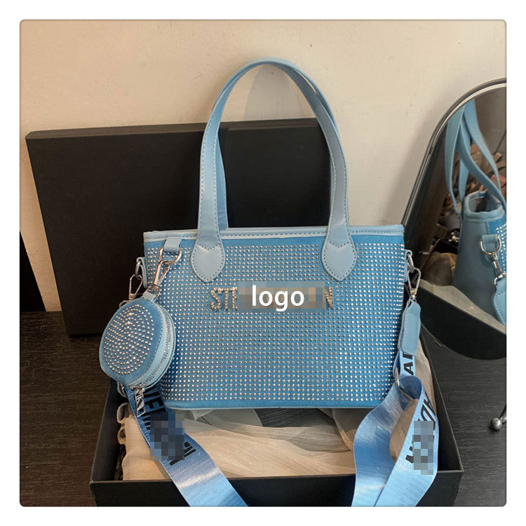 Bolso de letras de diamantes de imitación transfronterizos diseño de nicho femenino moda simple portátil popular 2025 nueva textura bolsa de mensajero