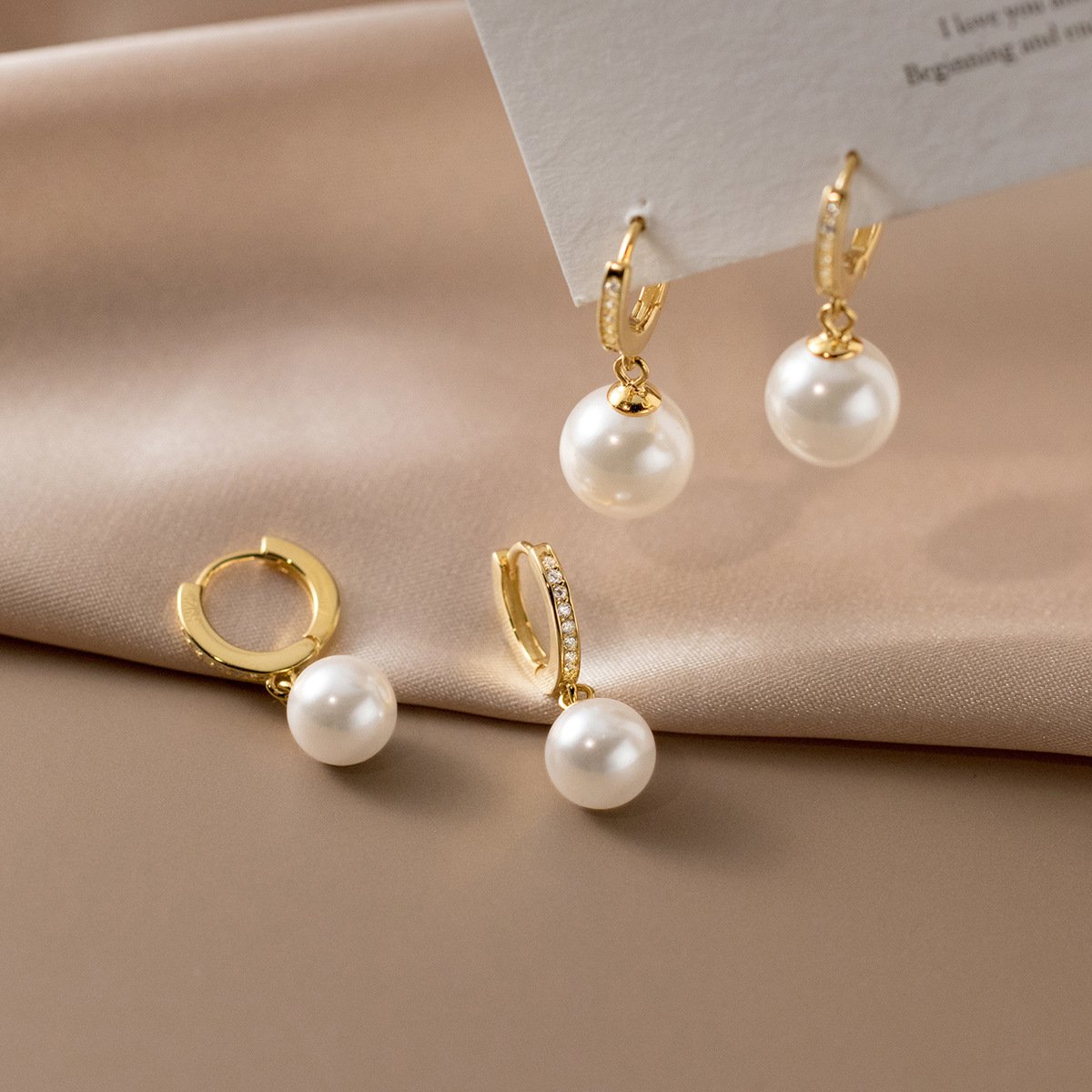 Eloch S925 plata esterlina simple estilo de diamante completo perlas de perlas en el viento de nicho de diseño de orejas M05251