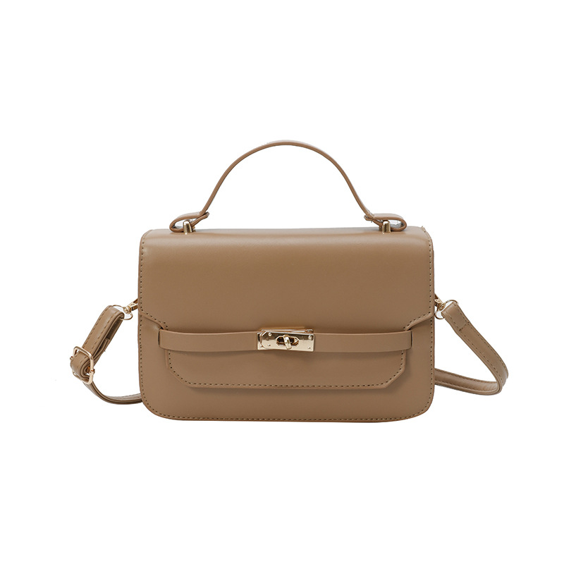 Bolso de mano de color sólido nuevo estilo 2025 simple bolso de hombro de primavera coreano de moda con cierre bolso pequeño