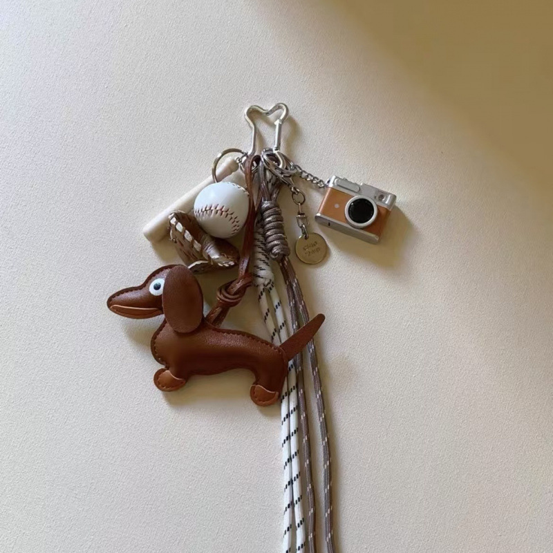 Bolsa de viento, bolsa de colgante, muñeca de viento, cuerda de nylon colgante, conejo, cachorro, cámara, llavero, mochila escolar