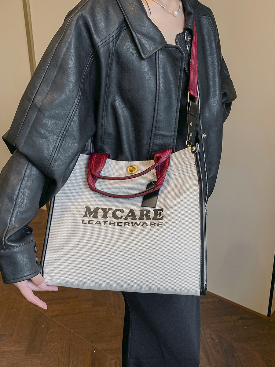Bolsa de mano de lona de gran capacidad para mujeres 2024 nueva moda impresa letras mochilas bolsa de viaje casual