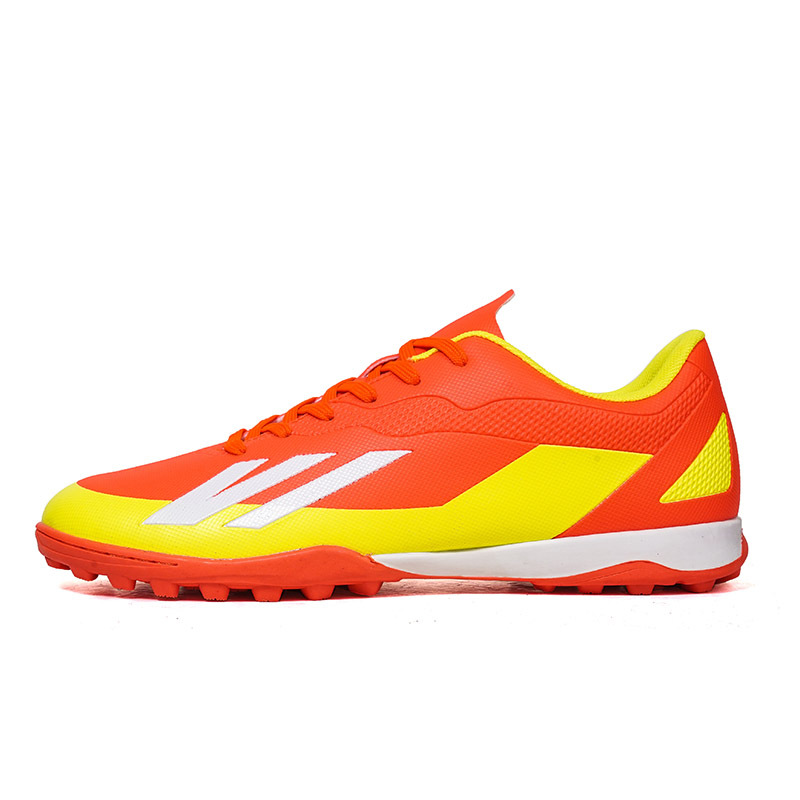 2025 zapatos de fútbol nuevo color juvenil anti-deslizante hombre y mujer AG clavos largos de césped estudiantes fabricantes transfronterizos