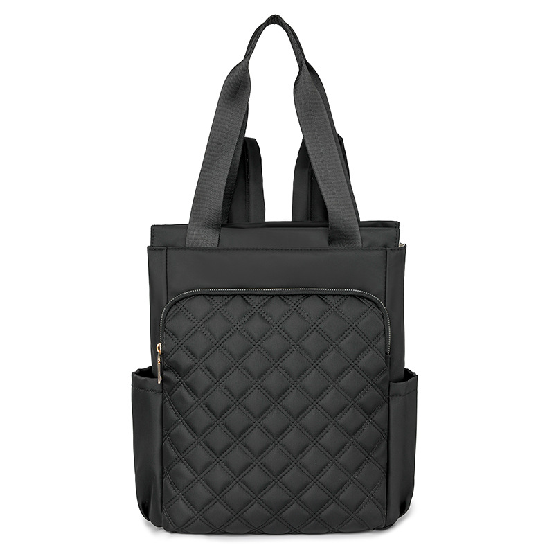 Mochila de mujer salvaje de color puro 2024 nueva mochila portátil de moda, bolso de viaje ligero y de gran capacidad