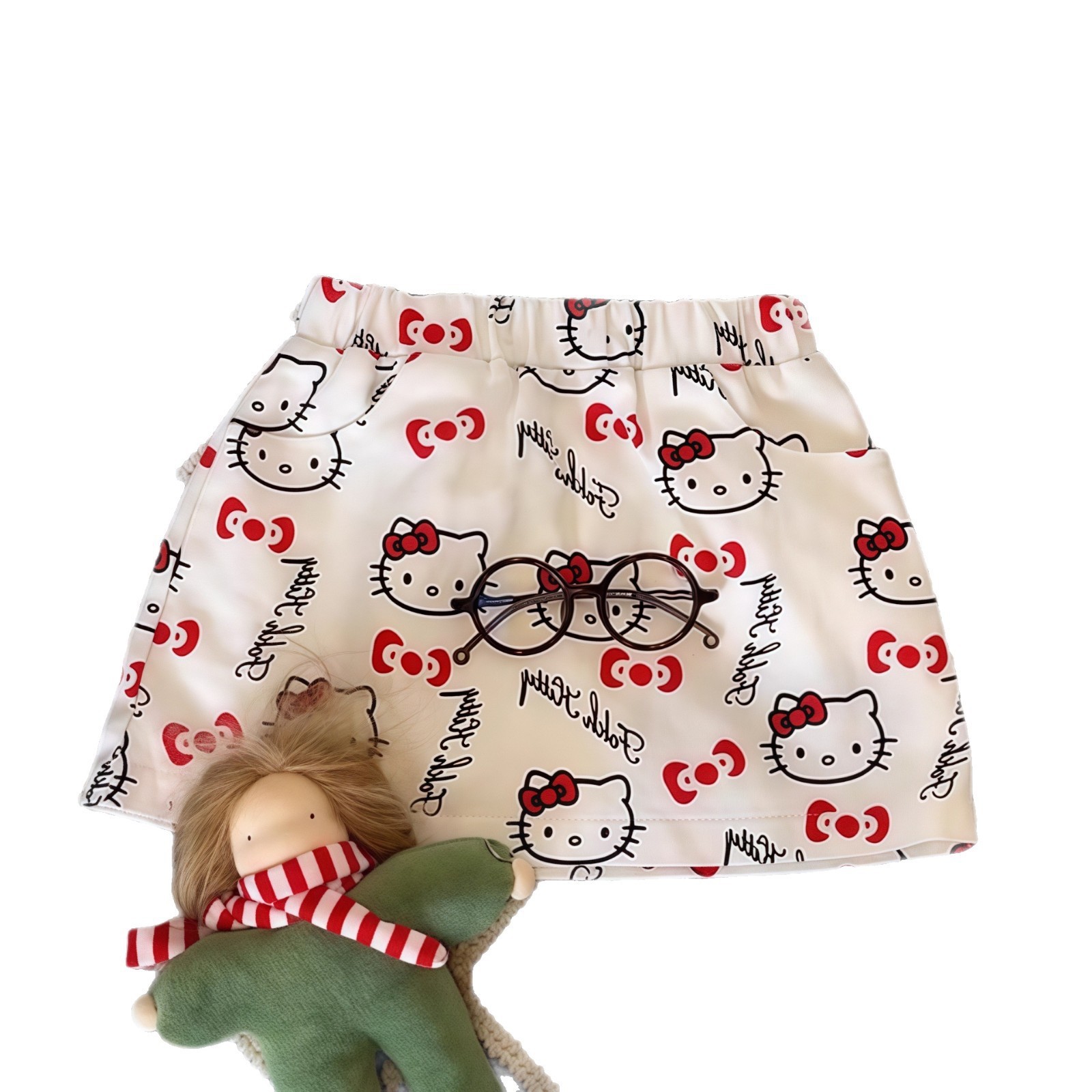 Xianning siete niñas nueva falda corta tesoro femenino verano impresión completa KT gato falda de dibujos animados salvaje estilo occidental red de Internet ropa para niños