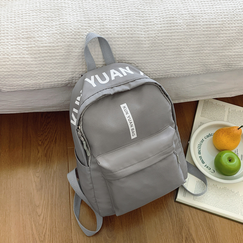 Mochila INS de estilo japonés para niñas, estudiantes de secundaria, mini mochila simple y versátil, mochila pequeña ligera para salidas de primavera, informal.