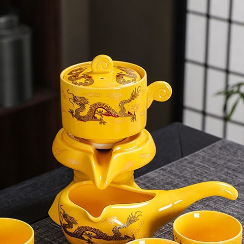Juego de té automático de molino de piedra perezoso de cerámica retro
