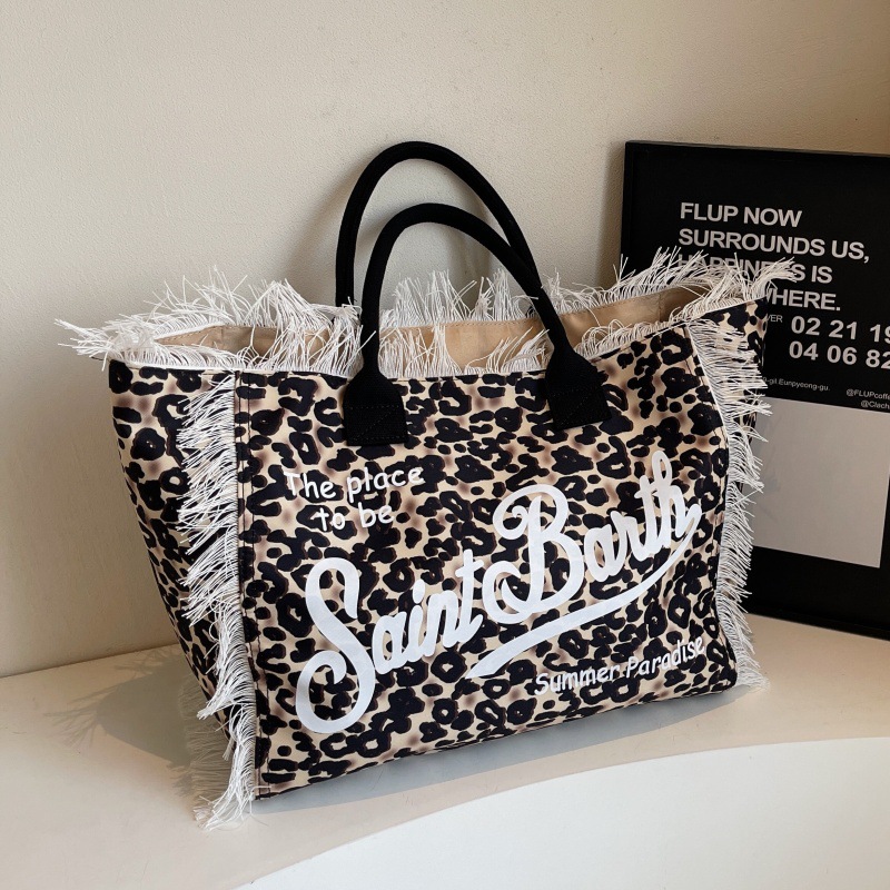 Bolso de moda coreano de moda de verano 2025, nuevo bolso de mano de leopardo personalizado, bolso de hombro retro de gran capacidad.