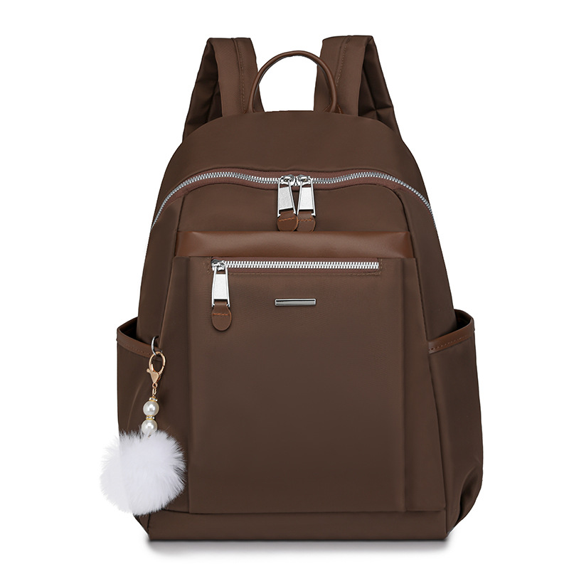 Mochila de nailon para mujer 2024 nueva moda salvaje para mujer mochila para desplazamientos urbanos mochila de gran capacidad al por mayor