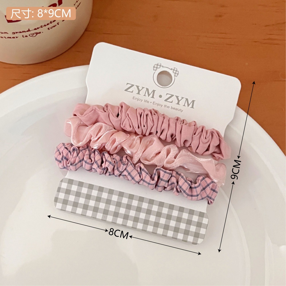 Primavera y verano dulce anillo de cabello conjunto de cuerda de cabello pequeño dulces frescos adornos de cabello de color de la niñez de banda de goma universal toque