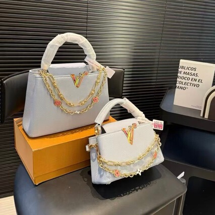 New Model Capucines Luxury Women's Handbag, Hand-Held and Crossbody Bag with Flap, Lettered Design, Stylish Chain Messenger Bag New Model Capucines Luxury Women's Handbag, Hand-Held and Crossbody Bag with Flap, Lettered Design, Stylish Chain Messenger Bag