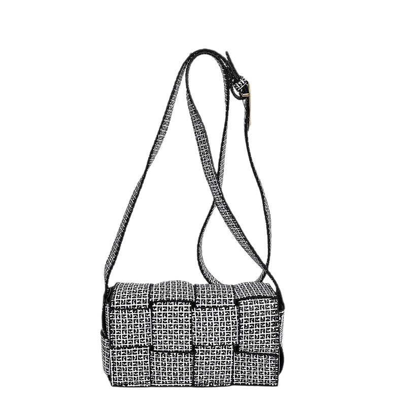 2025 nuevo otoño trenzado empalme de color sólido personalidad simple temperamento fresco estilo de hombro bolso de viaje